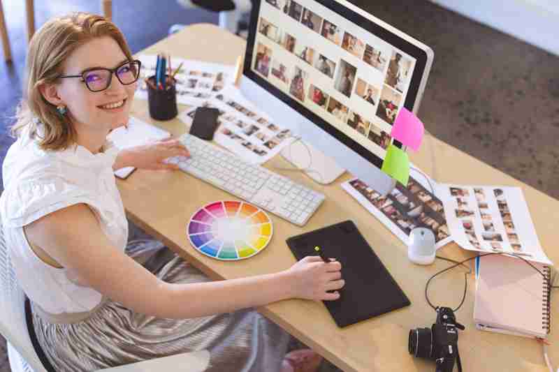 young-caucasian-female-graphic-designer-working-on-F7SDUEX.jpg